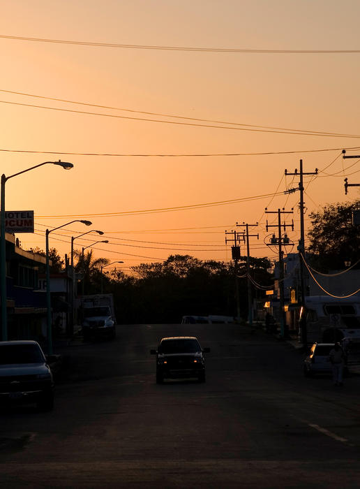 sunset silhouette in a mexican street